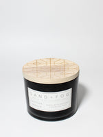 Tahitian Vanilla 12 oz scented candle Black vessel with Carved geometric lid